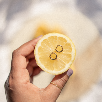 18 karat gold bold huggie hoop earrings