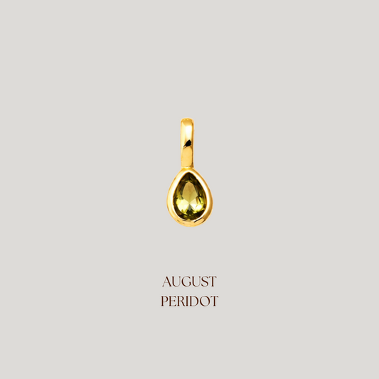 Gold teardrop pendant with a gemstone on a light gray background, labeled 'August Peridot'.